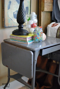 Plucked from obscurity. Thrifted to Décor. Being chosen. This grey metal typewriter table makes the perfect nightstand and is a reminder that we are seen. www.huntandhost.net