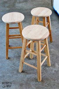 Cheap to chic bar stool makeover. See how quick and easy you can transform projects with a paint sprayer and tent. A paint spray tent provides protection and easy clean up for a messy painter like me.