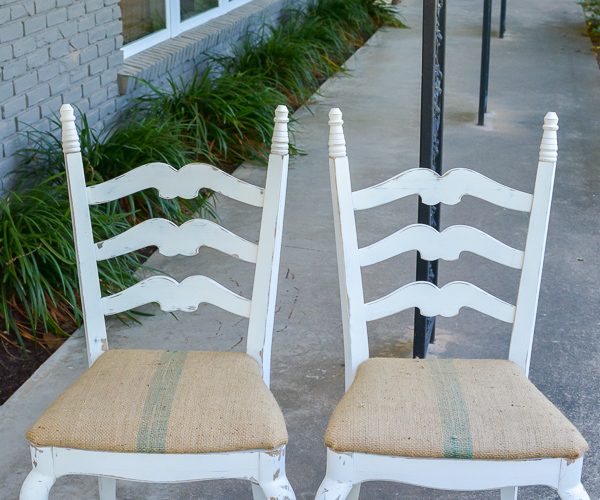 These chairs matched at one time, but one got cut down. This makeover gets them back to matching and adds height with finials. Coffee bean sack fabric is perfect for the new seat cushion.
