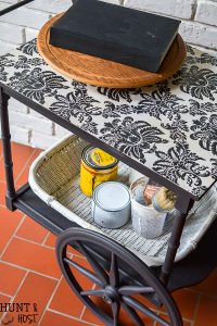 This beautiful old tea cart gets a sleek makeover into a rolling craft cart with an easy DIY tutorial!
