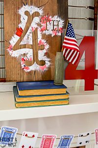 How cute is this playing card garland...great 4th of July decorating ideas here, red, white and blue from the dollar store!