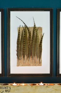 DIY Pheasant feather art tutorial. This easy DIY art tutorial will provide you with elegant artwork for your home with a budget friendly price!