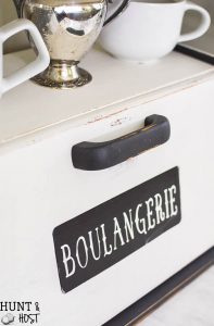 This bread box makeover is perfect for hiding kitchen clutter, kitchen storage ideas, a great coffee bar or the perfect family charging station. 80's bread box to French Country Décor!
