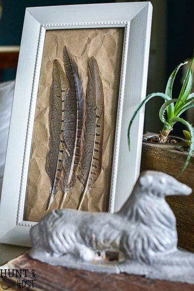 A great gift for guys this DIY small peasant art is easy and inexpensive to make from Pheasant feathers!