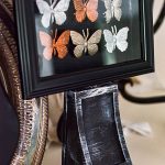 Halloween decorating ideas from the dollar store. These gilded bugs display cases are glamorous and easy to make Halloween décor.