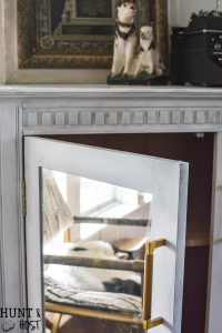 I can't believe this old entertainment center was on the curb. Now it is a fabulous antiqued mirror French chest.