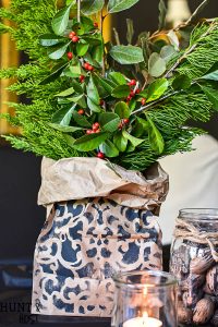 This easy holiday centerpiece idea is perfect for a last minute table or a large banquet setting. Easy and inexpensive paper bag