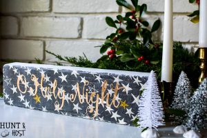 This easy reversible fall and Christmas decoration will help you knock out two holiday decorating projects in one sitting! Napkin decoupage is perfect for a festive holiday background.