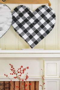 This giant DIY for Valentine's Day can be made in any size and would be great for other holidays! DIY Valentine's Day decor hearts are easy to style to your decor, black and white buffalo check and plaid shirt patterns add a fun touch instead of traditional Valentine pink!