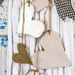Create boho chic wall hanging decor from your old linens. Purging the linen closet will provide tons of great crafting material. This DIY wall hanging is dressed up for Valentine's Day, but would be great for a farmhouse feel any time of year. WIth great texture from burlap, drop cloth and tin foil this tone on tone neutral decor is a versatile addition to any style, Simple natural touches round out this Valentine home tour.