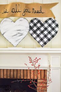 This giant DIY for Valentine's Day can be made in any size and would be great for other holidays! DIY Valentine's Day decor hearts are easy to style to your decor, black and white buffalo check and plaid shirt patterns add a fun touch instead of traditional Valentine pink!