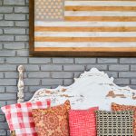 How to make a neutral American Flag decor piece, perfect for your living room or porch, great on a mantel or wall art. This DIY American flag wood decor has perfect clean lines thanks to Frogtape. #porchdecor #summerdecorating #frogtape #frogtapeprojects #diyWoodSign #RedWhiteandBlue #oldGlory #PatrioticDecor #flag #AmericanFlag #FourthofJuly
