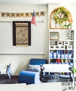 The cutest farmhouse classroom you ever saw. Visit this school room inspired by Magnolia Market and Joanna Gaines. It will have you wanting to pack a lunch and go back to school with it's fresh black and white decor and trendy farmhouse vibe. #farmhouseclassroom #farmhouseclassroomtheme #bulletinboard #farmhouseschool