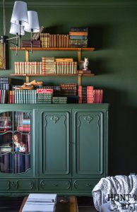 Built in cabinets can be expensive, read all the reasons to use open shelving vs built-in storage for a more stylish and affordable home. Make your study or library room cozy and charming with this moody green paint and faux built-in. #fremchcountrycottage #libraryroom #openshelf #storageideas #DIYcabinet #DIYstorageidea #frenchcountryoffice