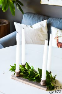This DIY aged barn wood decor idea is so simple. Make a dual use tray out of DIY barn wood for a festive candle riser or gorgeous rustic centerpiece. #barnwood #barnwooddecor #barnwoodproject #candleriser #centerpieceidea