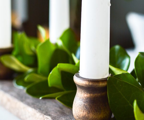 This DIY aged barn wood decor idea is so simple. Make a dual use tray out of DIY barn wood for a festive candle riser or gorgeous rustic centerpiece. #barnwood #barnwooddecor #barnwoodproject #candleriser #centerpieceidea