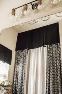 Steal some cozy black and white bathroom ideas to decorate you bathroom into a haven! The floor to ceiling shower curtain treatment and indoor window flower box are fabulous! #blackandwhitedecor #blackandwhitebathroom #teenbathroom #cozybathroomidea #showercurtainideas #DIYwindowbox #indoorwindowbox #tweengirldecorating
