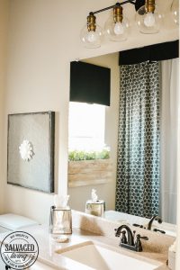 Steal some cozy black and white bathroom ideas to decorate you bathroom into a haven! The floor to ceiling shower curtain treatment and indoor window flower box are fabulous! #blackandwhitedecor #blackandwhitebathroom #teenbathroom #cozybathroomidea #showercurtainideas #DIYwindowbox #indoorwindowbox #tweengirldecorating