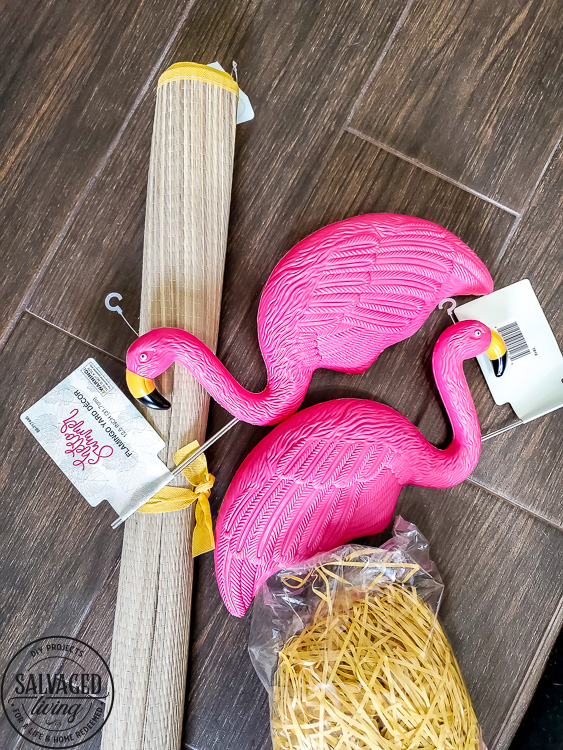 Good, cheap table decor for summer from the dollar store! Nothing beats a cute flamingo centerpiece and dollar store decor accents for an inexpensive kickoff to the summertime. See these creative DIY summer table ideas come to life from the 99 Cent Only Store! #dollartree #dollarstore #summertablescapes #summercenterpieces #simplesummer #flamingodecor #dollartreediy #flamingoparty
