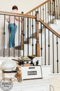 How to build a stylish stairway gate to keep pets or kids out! This easy DIY gate tutorial will look great and blend with your traditional decor. We keep our dog off the carpet with this pet gate. #petgate #stairgate #childproof #DIYpet #cleancarpet #doggate #petgatediy #petgateforstairs