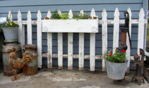 Add picket fence projects to your decor for cute, classic, country, farmhouse decor on a budget! These creative picket fence projects will add instant age and appeal to your home with a budget friendly DIY procetag. #picketfence #DIYfarmhousedecor #budgetdecor #upcycledfenceprojects #easyDIYideas #gardendecor #towelholderideas #DIYanimalaccessories