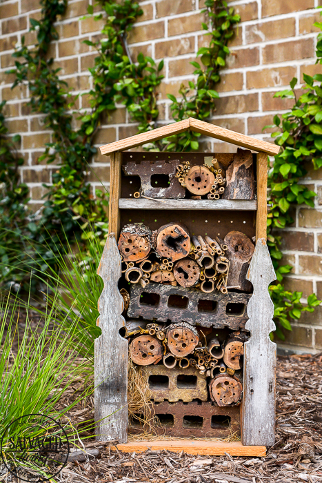 How to build a DIY bug house from scrap wood, perfect for a summer project with kids. Invite good bugs into your garden with this bug hotel, you will soon find solitary bees and insects taking up residence in your yard. #bughouse #savethebees #goodbugs #scrapwood #buildlikeagirl #gardenart #gardenproject #naturalgardencare