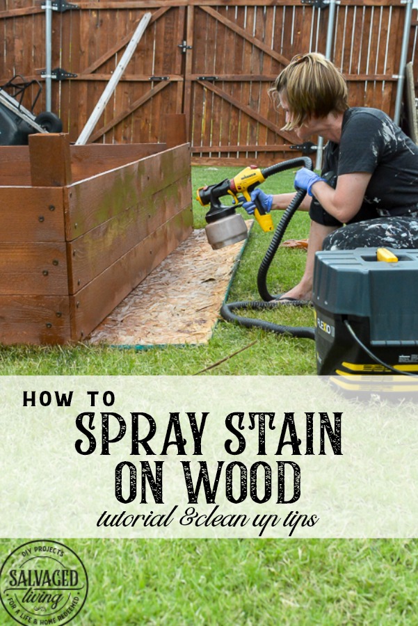Learn how to spray stain on wood along with tips on how to clean your sprayer when you spray an oil based stain. HINT: it is so much easier than you think! This DIY raised garden bed got a spray stain that will help the wood look good and last longer and it only took minutes to do,. #wagnerspraytech #spraystain #oilbasedstain #paintcleanup #sprayertips #stainedwood #flowergarden #vegetablegarden #raisedbed #landscapedecor #fencestain #diyfencestain 