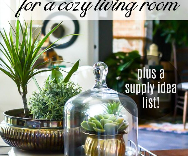 Grab these coffee table decor ideas for a cozy living room. This post is awesome, it has a list of must have elements for cozy coffee table styling plus a list of supply ideas for your cozy coffee table to be magazine worthy! #coffeetablestyle #coffeetabledecor #vignettestyling #decortips #decorating101 #decoratingtips #cozylivingroom #livingroomdecor #coffeetabledecorideas