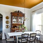 A plain dining room gets an upgrade to vintage glam with a gorgeous gold painted ceiling. See the best paint color for a metallic gold ceiling, perfect for a vintage dining room, classy master bedroom or stunning in a small bathroom. #5thwall #paintedceiling #ceilingcolor #metallicgoldpaint #diningroommakeover #vintagestyle