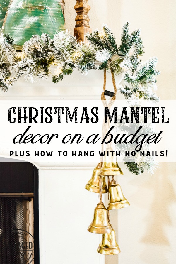 Decorate your mantel with these budget friendly ideas this Christmas! Plus I have a great tip on how to hang garland without nails for damage free decorating! This simple cardboard craft rounds out the Christmas fireplace decorations! #DamageFreeHolidayDecor #CommandDoNoHarm #cardboarddecor #fireplacedecor #vintageChristmas #budgetgarland #easyChristmasdecor 