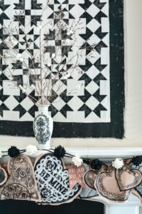 Decorate for Valentine's Day with this neutral black and white theme for stunning Valentine's Day decor and crafts. You can see how to get this look from dollar store supplies for your Valentine's Day decorating ideas! #dollarstoreValentinedecorations #DIYValentinesday #romanticValentinesdaydecor #vintageValentine
