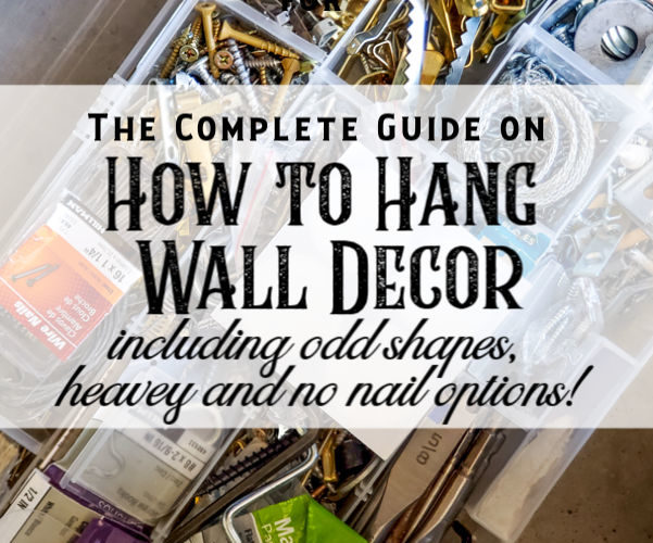 The ultimate guide to how to hang odd shaped items, including heavy items, mirrors, pictures on a wall, hanging without nails, and more. I will show you what hardware I use to hang platters, tins, book pages and bowls. #howtotips #wallhanginghardware #nonailholes