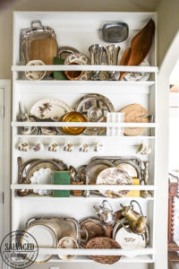 Does you house lack built in charm? Add your own with this diy built in plate rack tutorial. You will learn how to build a wall plate rack and how to decorate a plate rack for vintage style charm and a cozy home. #cozyhome #farmhousekitchen #kitchendisplay #butlerspantry