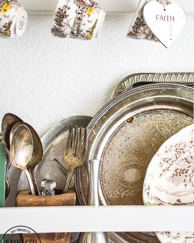 Does you house lack built in charm? Add your own with this diy built in plate rack tutorial. You will learn how to build a wall plate rack and how to decorate a plate rack for vintage style charm and a cozy home. #cozyhome #farmhousekitchen #kitchendisplay #butlerspantry