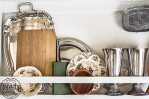 Does you house lack built in charm? Add your own with this diy built in plate rack tutorial. You will learn how to build a wall plate rack and how to decorate a plate rack for vintage style charm and a cozy home. #cozyhome #farmhousekitchen #kitchendisplay #butlerspantry