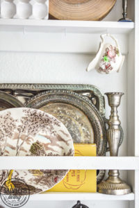 Does you house lack built in charm? Add your own with this diy built in plate rack tutorial. You will learn how to build a wall plate rack and how to decorate a plate rack for vintage style charm and a cozy home. #cozyhome #farmhousekitchen #kitchendisplay #butlerspantry