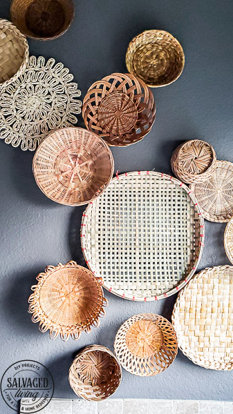 everything you need to know about creating basket gallery wall art. Where to find vintage baskets, how to hang baskets and how to layout a basket gallery wall are all here in this gorgeous gallery wall trend idea. #vintagedecor #wovenbaskets #basketwall #gallerywall