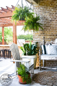 Looking for the perfect patio decorating ideas to create an outdoor living space you'll love? Well, here is a shopping guide and photo display of a cozy patio you can grab decorating ideas from and even see the patio furniture sources! #patiodecor #backyardseating #outdoordecor