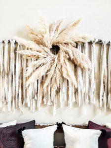 Learn how to make your own Pampas Grass Wreath, this DIY tutorial is easy to follow and perfect for gorgeous fall home decor. A Pampas Grass Wreath adds luxurious beauty to your living room or mantel for a boho chic look that only nature decor can provide! #pampasgrasslivingroom #wreathmaking #wreathtutorial #decoratingwithnature