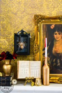 welcome to the Haunted Midas Mansion. These easy DIY Halloween mantel decoration ideas will inspire you to create an elegant Halloween home decor aesthetic that is a little bit vintage, kind of spooky and tons of fun. #indoorHalloween #Halloweendecorating #goldHalloweendecor