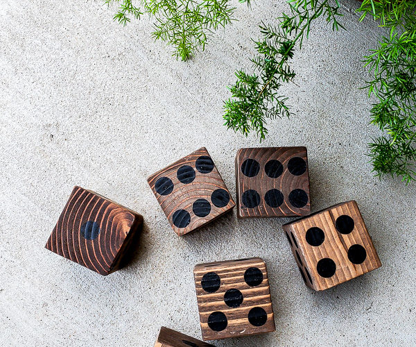 Learn how to make the perfect lawn dice for your outdoor game collection. #gamenight #scrapwood #diygames #outdoorideas