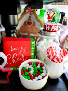 Get some fun and budget friendly Christmas hot chocolate bar ideas here! Everyone loves a good hot cocoa station for Christmas and the dollar store and Walmart are great spots for hot chocolate bar decor. Plus a few DIY projects to add to the mix! Have fun dressing up the perfect holiday beverage station! #hotchocolatebardideas #hotcocoabar #christmasdecorideas