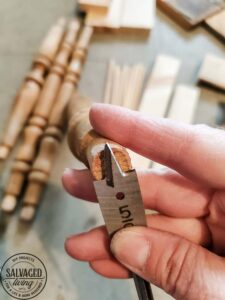 Learn how to repurpose old spindles into reusable decor items for everyday and holiday decorating. This simple DIY tutorial will help you know what to do with old spindles. #upcycle #woodworking #spindlemakeover #decorstand