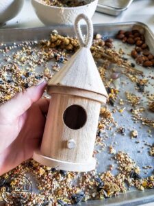 This edible glue is easy to make and use to decorate bird seed birdhouses or bundt pan suets. Make beautiful yard art that the birds will love and make your yard a wildlife wonderland! #birdfeeder #decorativebirdhouse #feedthebirds