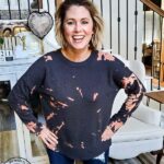 Learn how to bleach tie dye a sweatshirt with this simple video tutorial. Get a trendy bleach dyed shirt on a budget when you DIY it. This crafty clothing project is perfect to do with friends, family and kids. #bleachdye #tiedye #walmartclothing #budgetclothing