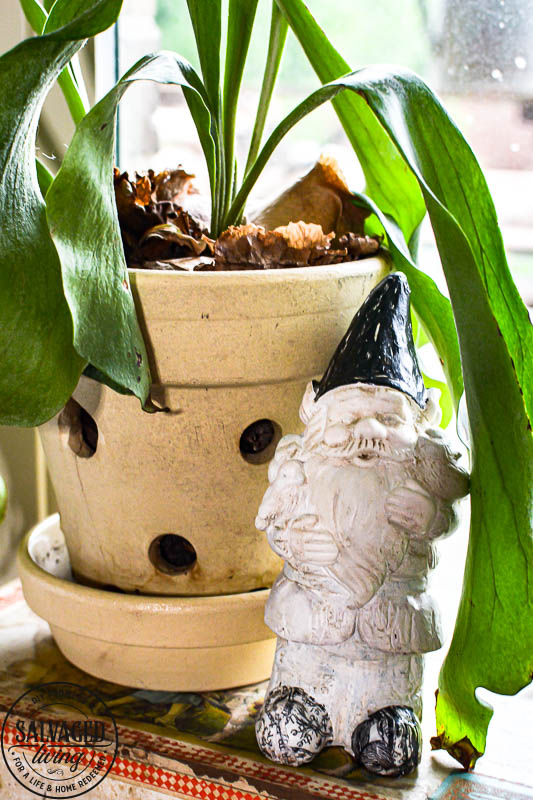 Dollar Store Gnome Makeover next to clay pot