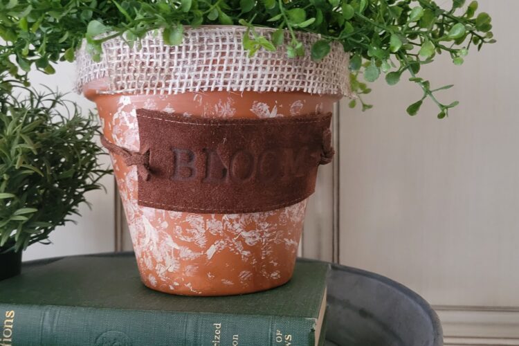 heat stamped old belt upcycle tag on planter