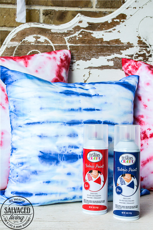 Create easy tie dye pillows with Testors fabric spray paint. This less mess tie-dye technique is so much easier than traditional tie-dye and gives you the same effect. This fabric paint dries soft and looks amazing for your holiday decor and pillows. Try this easy fabric craft for a multitude of craft ideas. #testors #testorscraft #crafttherapy #tiedye #fabricpainting #pillow #tiedyemethod #tiedyetechnique