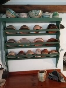 pottery filled plate rack