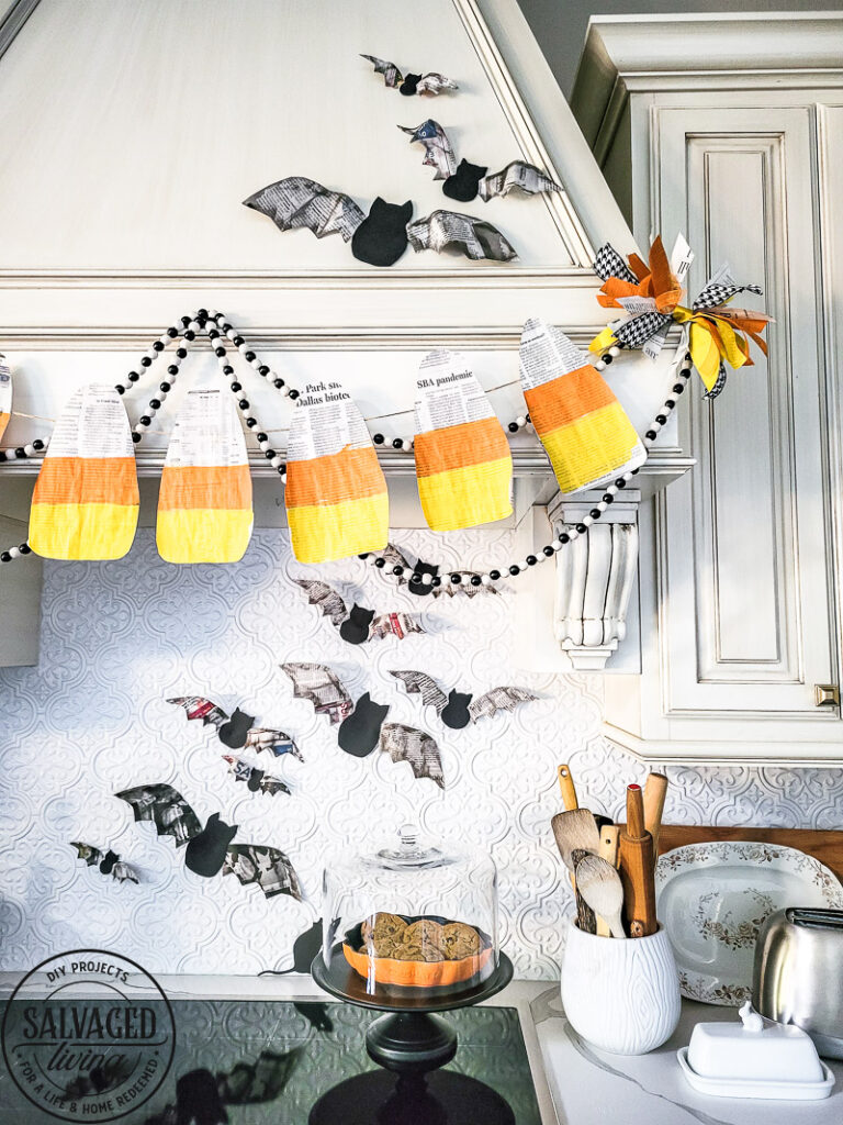 3 budget friendly DIY Halloween decorations are precious and so simple to make yourself. These Halloween decor ideas use newspaper as the main craft supply so you can create new Halloween decor that won't break the bank - turn those scary headlines into crafty decor instead! #papercraft #DIYHalloweenDecor #Halloweencraft #budgetHalloweenideas